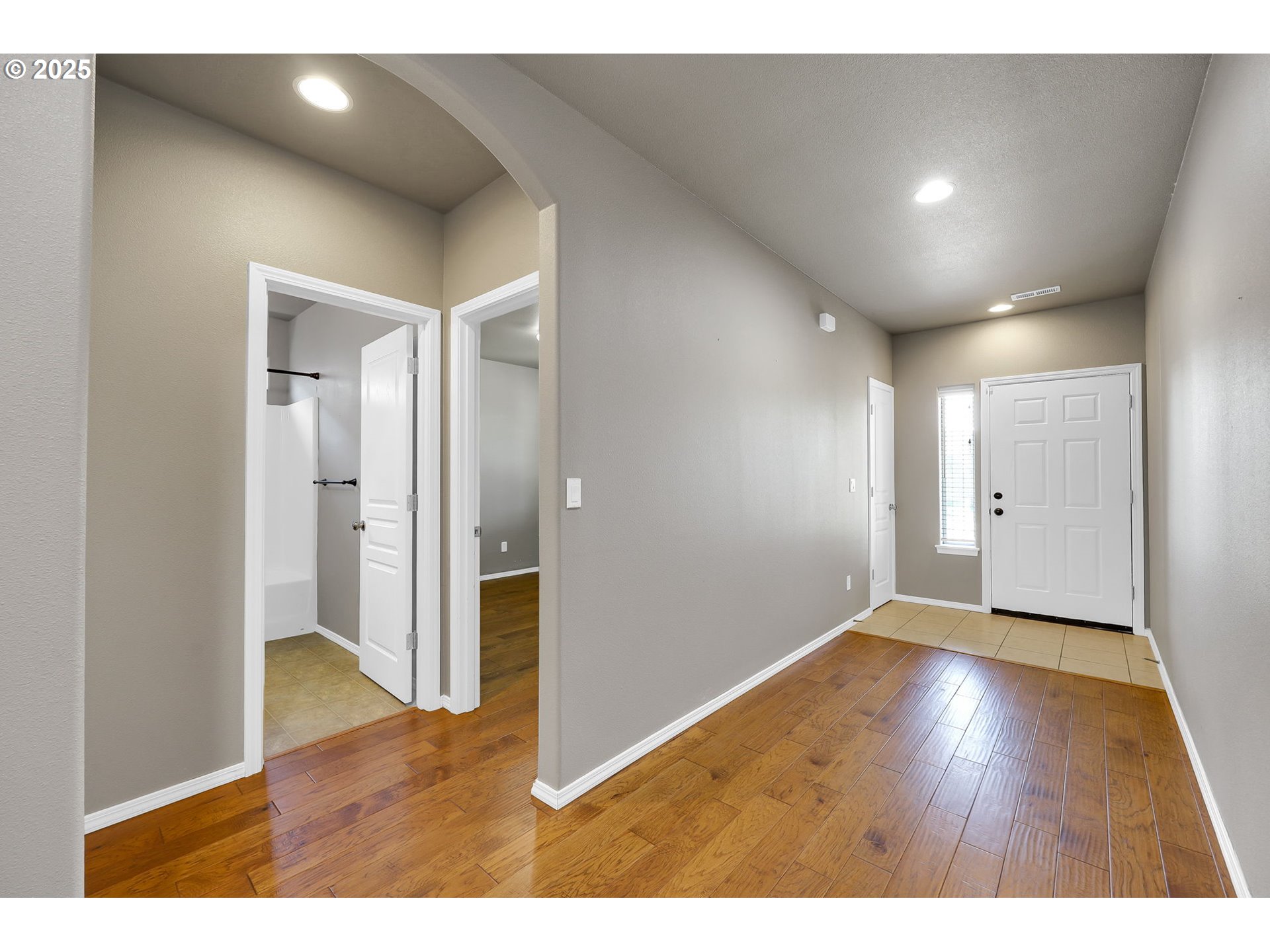 5770 Mineral Way Springfield, OR 97478 - Photo 3 of 18 a view of an empty room with wooden floor