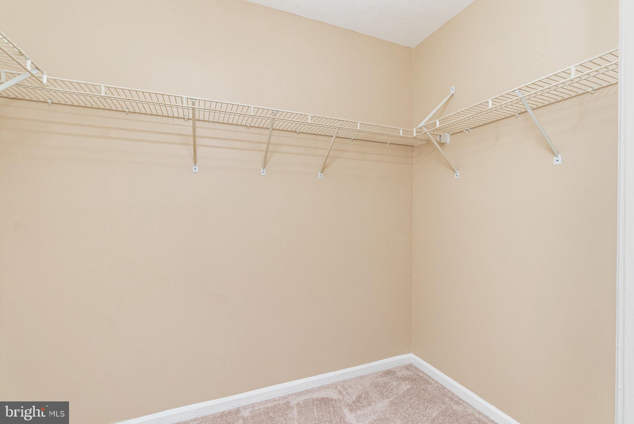 1401 Sage Lane, Unit 1401M Belcamp, MD 21017 - Photo 22 of 30 a view of a room with racks on the wall