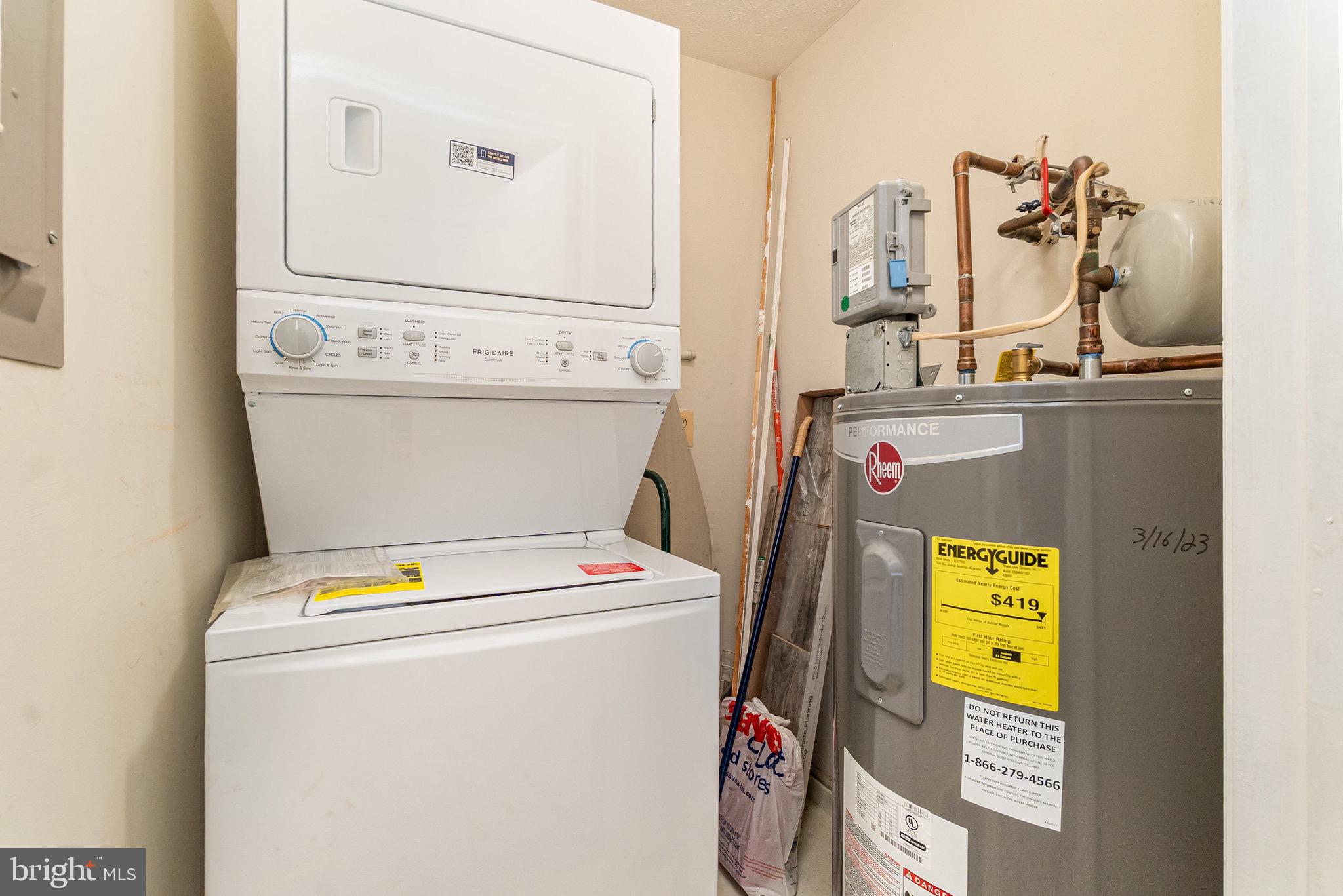 1401 Sage Lane, Unit 1401M Belcamp, MD 21017 - Photo 28 of 30 a utility room with dryer and washer