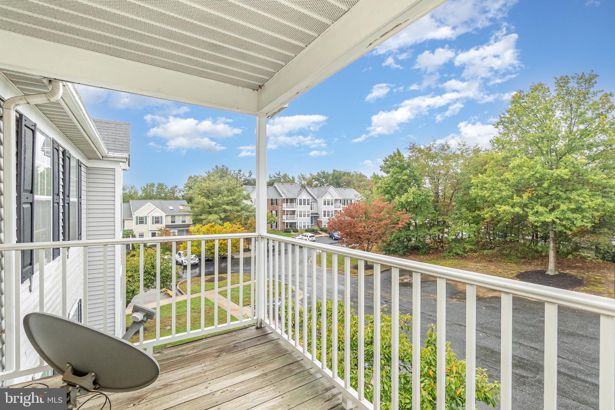 1401 Sage Lane, Unit 1401M Belcamp, MD 21017 - Photo 29 of 30 a view of a balcony with chair