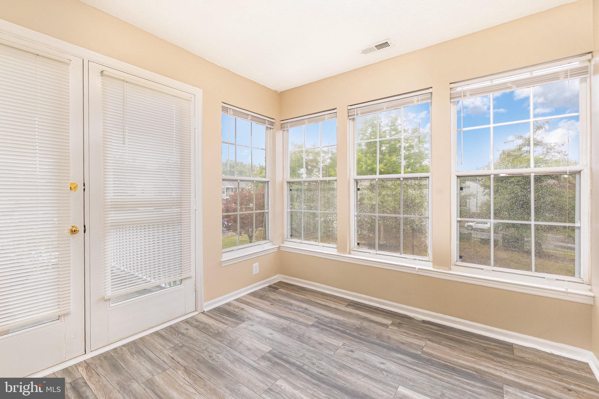 1401 Sage Lane, Unit 1401M Belcamp, MD 21017 - Photo 8 of 30 a view of an empty room with a window