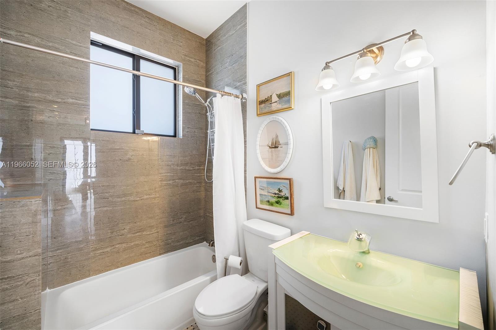 6001 Southwest 28th Street Miami, FL 33155 - Photo 23 of 30 a bathroom with a sink toilet and shower