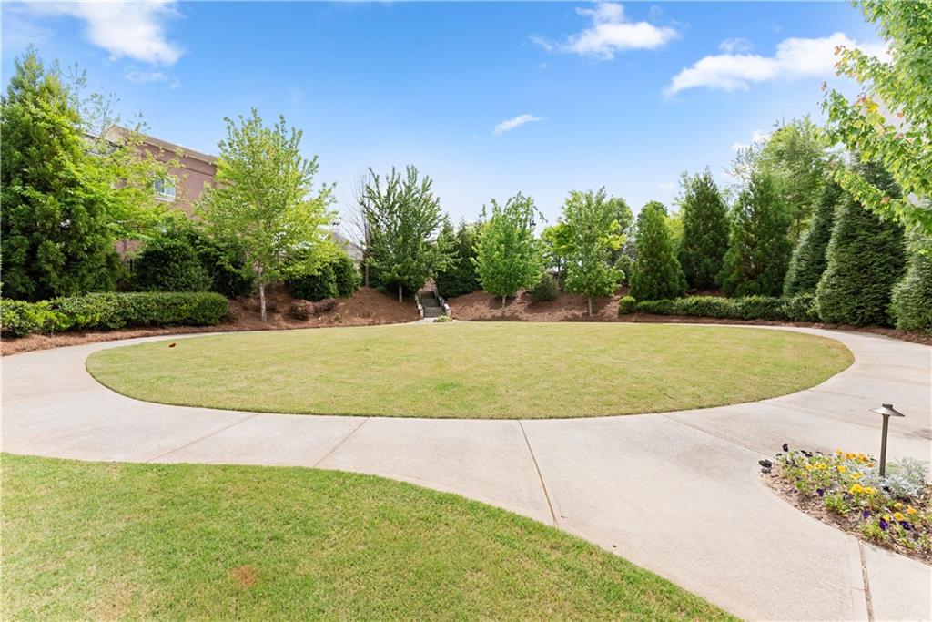3206 Ridge Towne Place Duluth, GA 30096 - Photo 36 of 42 a view of a swimming pool with a yard