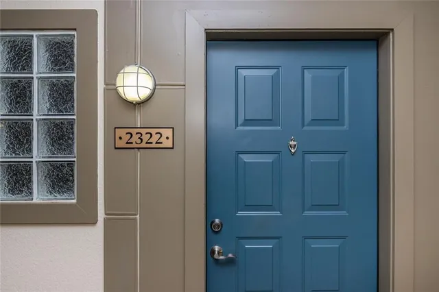 a front view of a house with outdoor shower