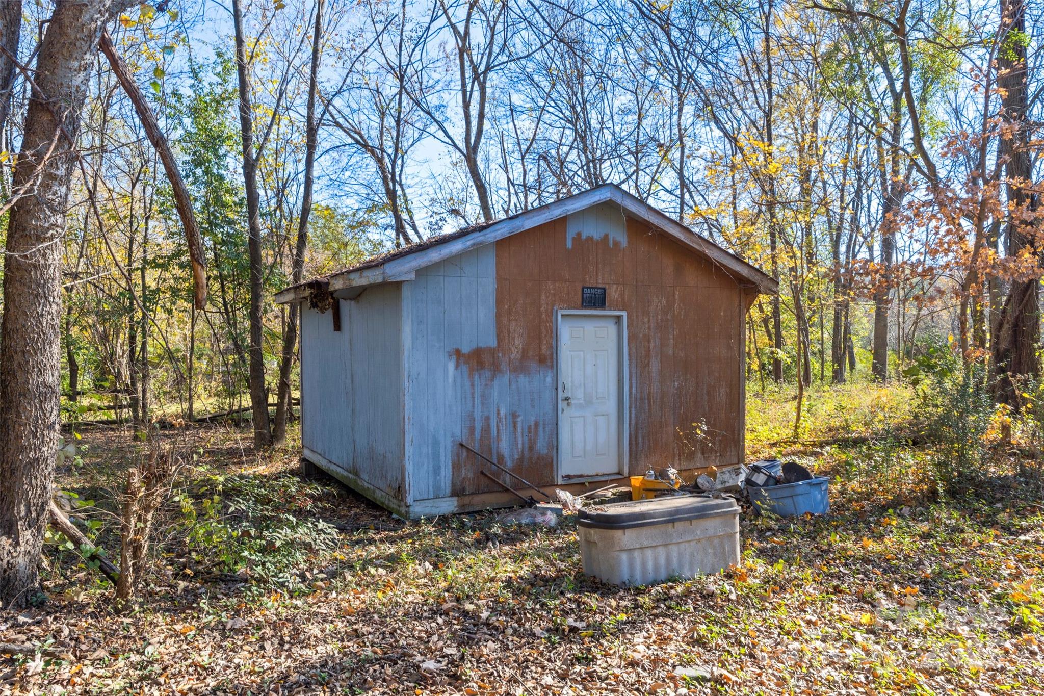 3913 Stough Road Concord, NC 28027 - Photo 18 of 20 a front view of a house with garden