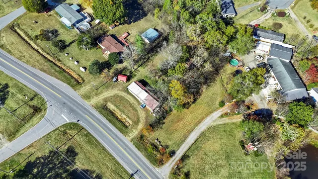 an aerial view of a house with a garden
