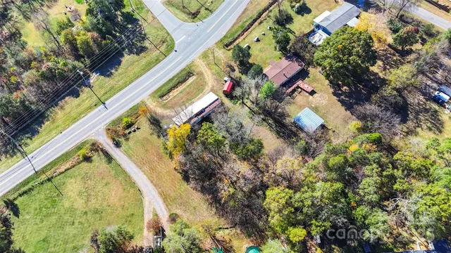 a view of large house with a yard