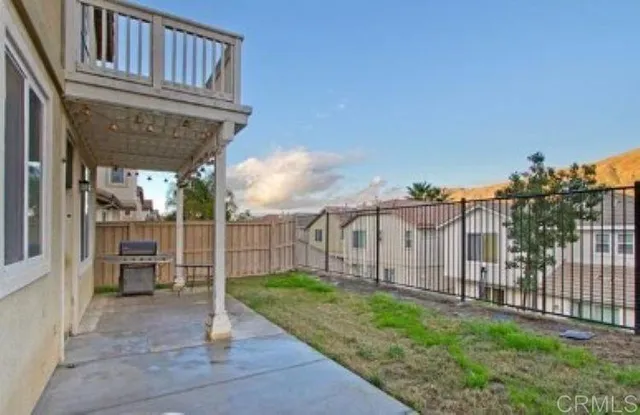 a view of a backyard with a garden