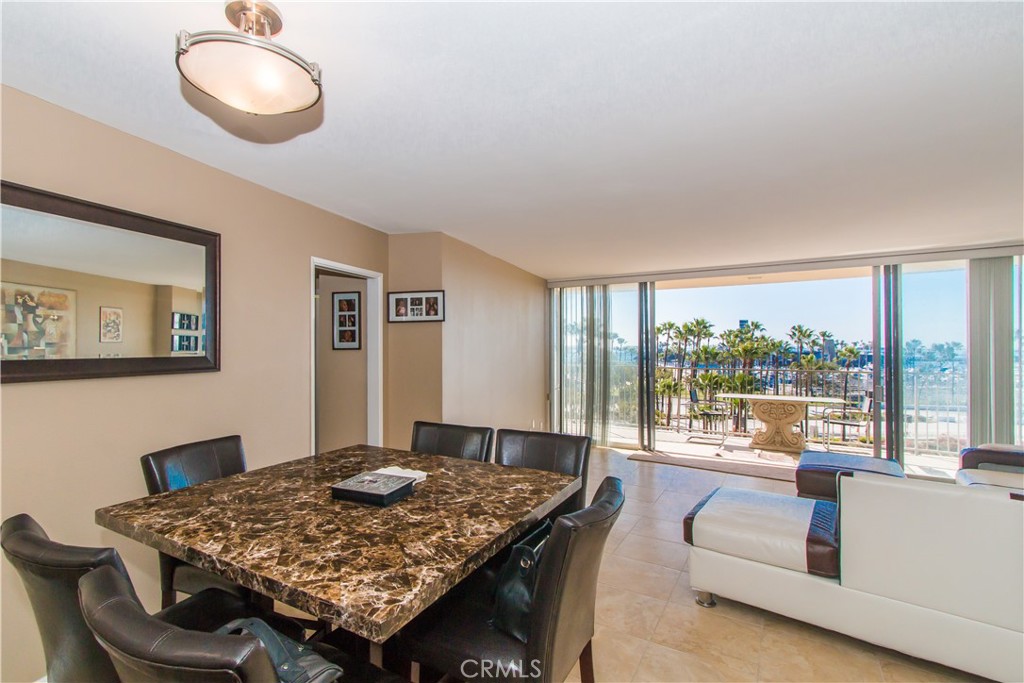 700 East Ocean Boulevard, Unit 706 Long Beach, CA 90802 - Photo 9 of 31 a living room with furniture and a large window