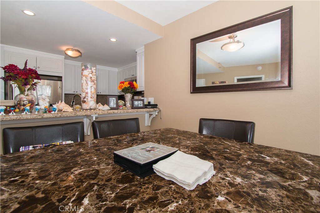 700 East Ocean Boulevard, Unit 706 Long Beach, CA 90802 - Photo 10 of 31 a bed room with a bed and a television