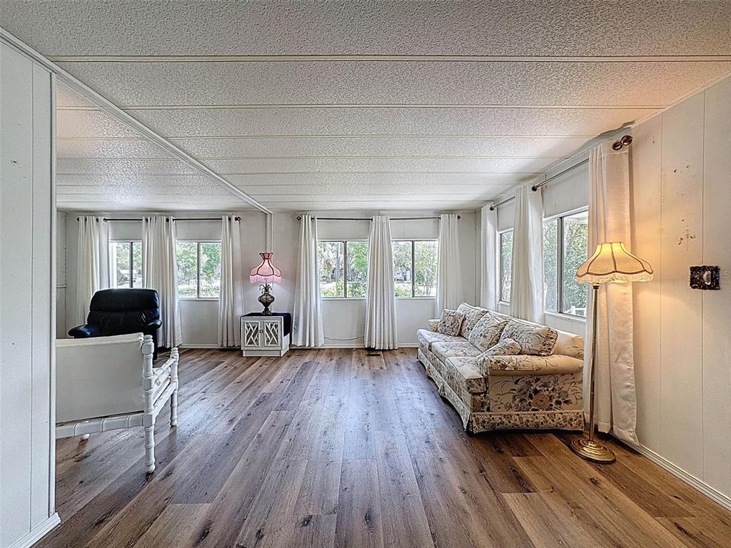 3249 Susan Drive Spring Hill, FL 34606 - Photo 11 of 60 a living room with furniture and a window