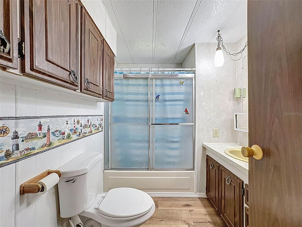 3249 Susan Drive Spring Hill, FL 34606 - Photo 45 of 60 a bathroom with a sink a toilet and shower