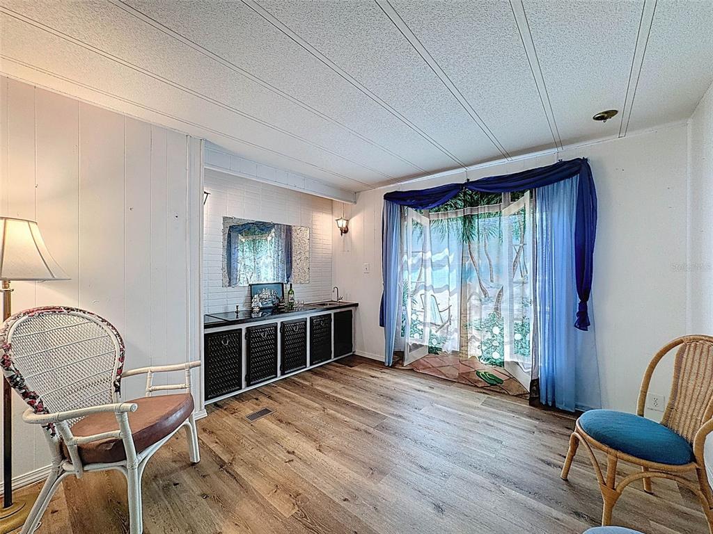 3249 Susan Drive Spring Hill, FL 34606 - Photo 47 of 60 a bedroom with a bed and furniture