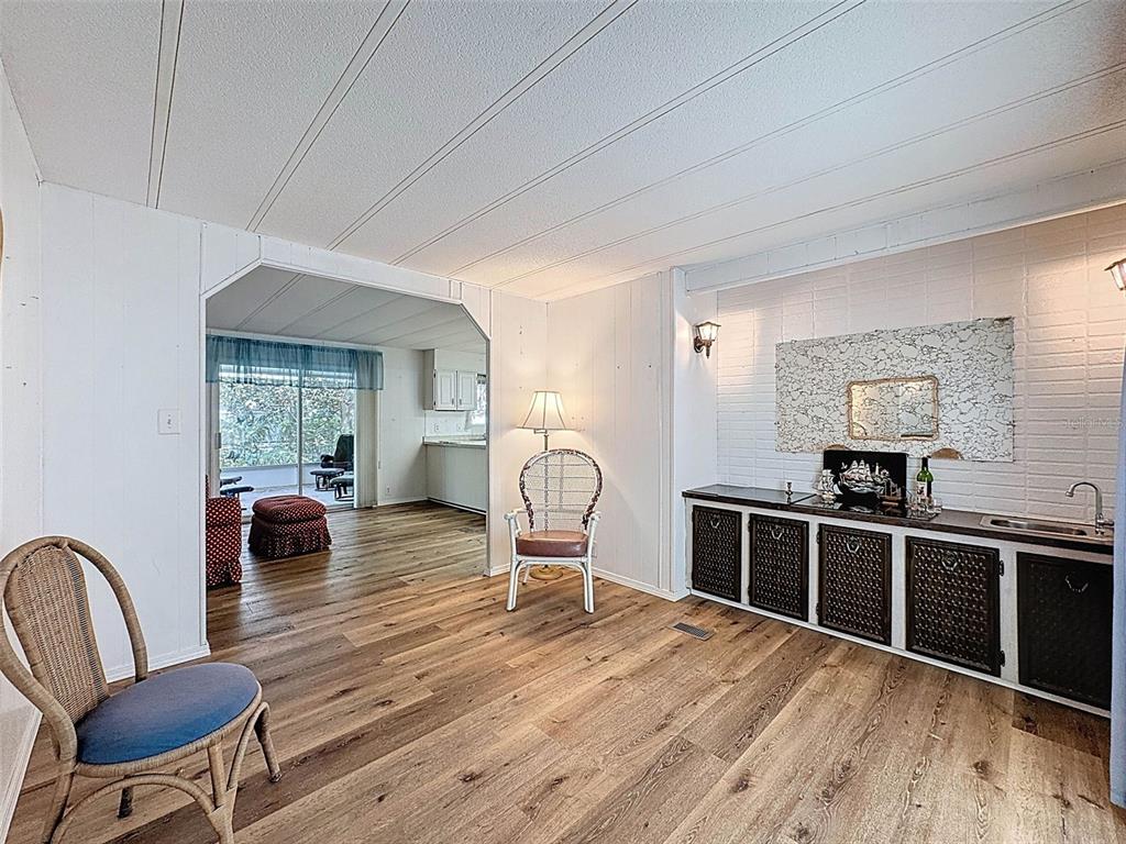 3249 Susan Drive Spring Hill, FL 34606 - Photo 49 of 60 a bedroom with furniture and wooden floor