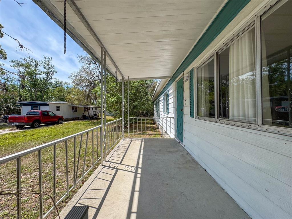 3249 Susan Drive Spring Hill, FL 34606 - Photo 5 of 60 a view of a house with a porch
