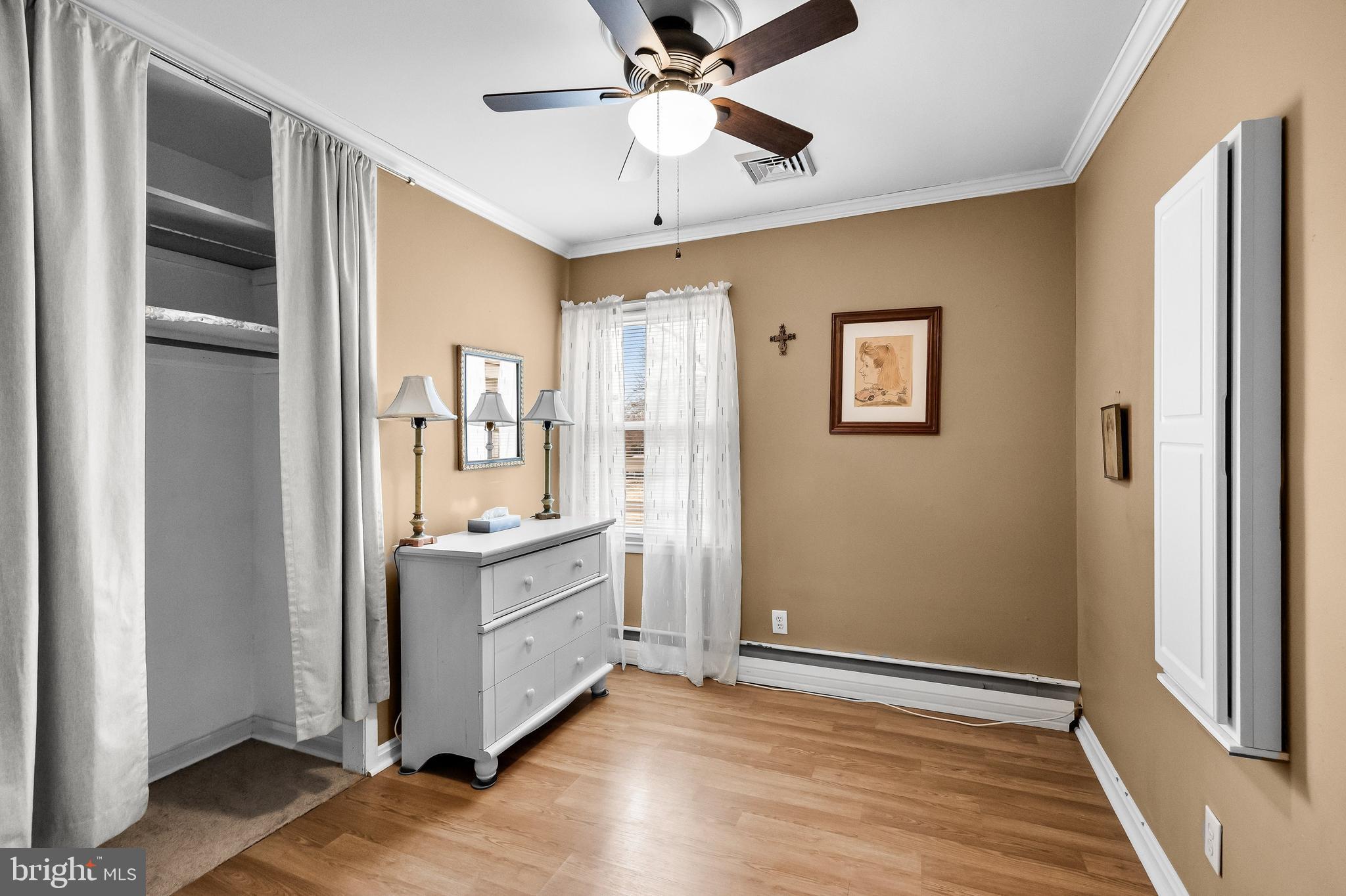 419 Delview Lane Delanco, NJ 08075 - Photo 11 of 21 a view of a hardwood floor and a ceiling fan in a room
