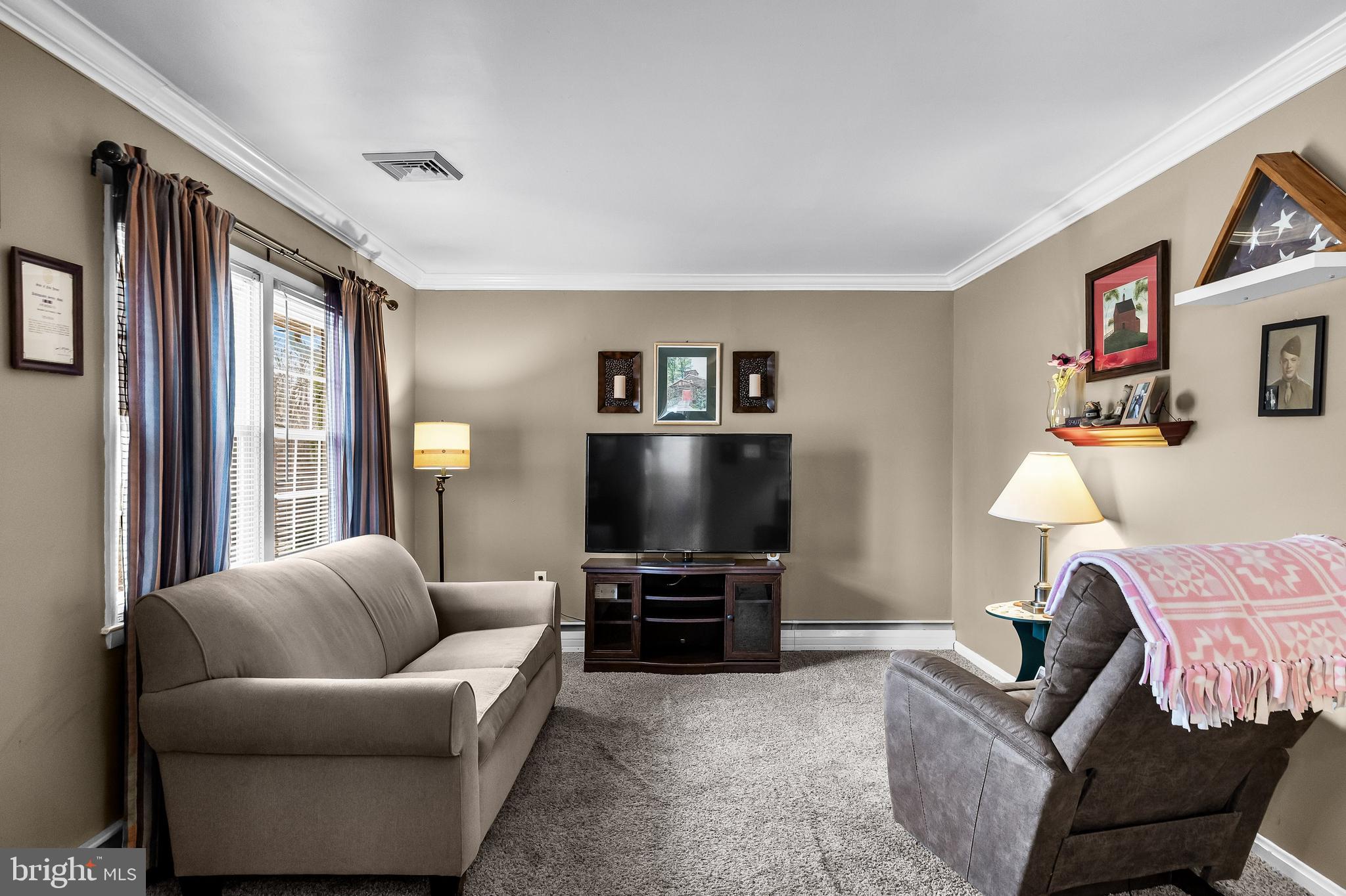 419 Delview Lane Delanco, NJ 08075 - Photo 2 of 21 a living room with furniture and a flat screen tv