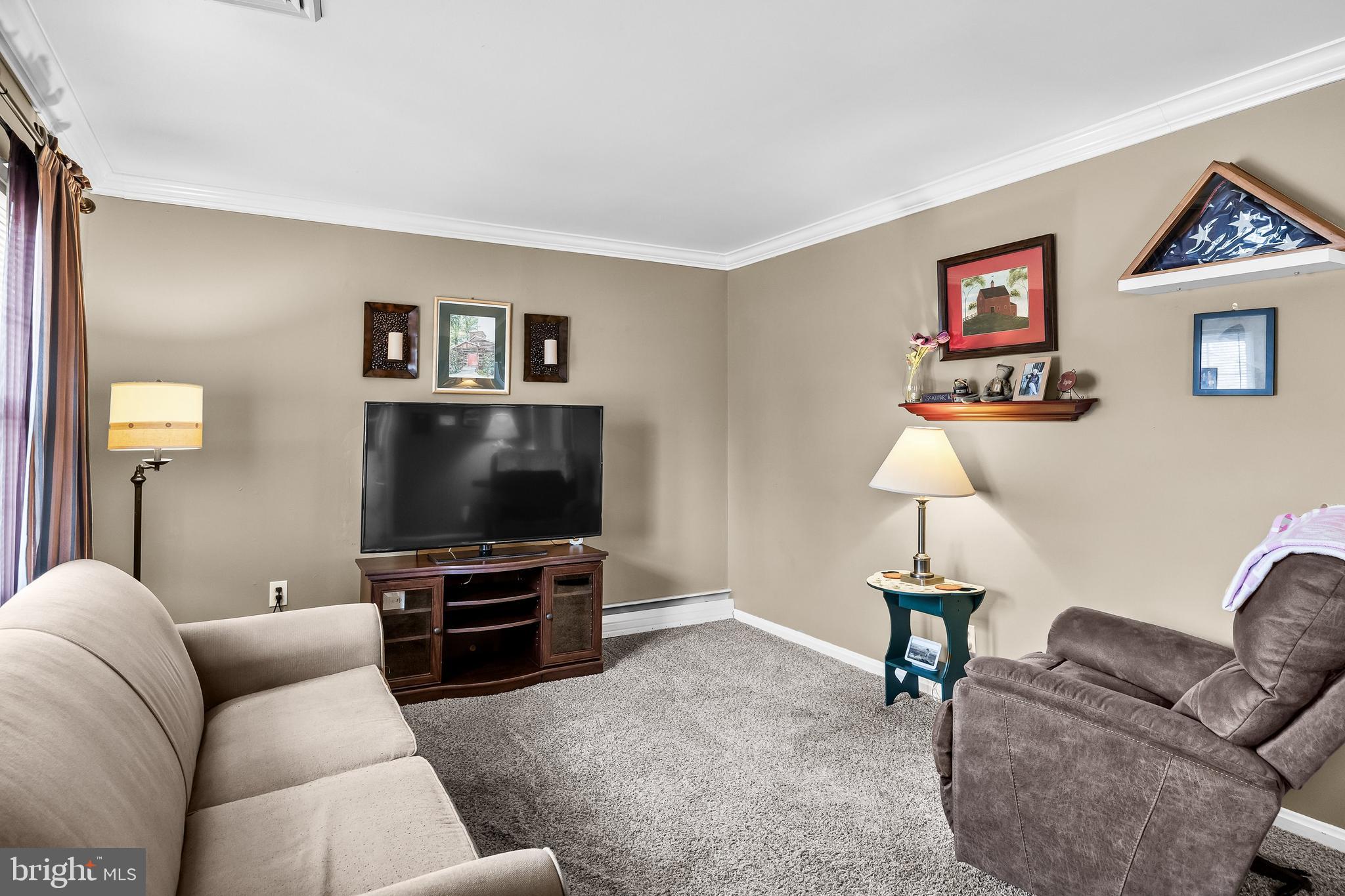 419 Delview Lane Delanco, NJ 08075 - Photo 3 of 21 a living room with furniture and a flat screen tv