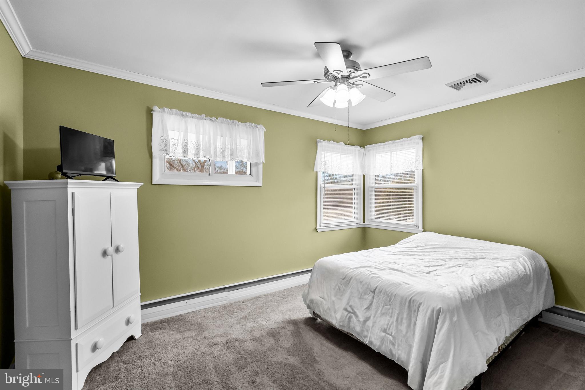 419 Delview Lane Delanco, NJ 08075 - Photo 9 of 21 a bedroom with a bed and a flat screen tv