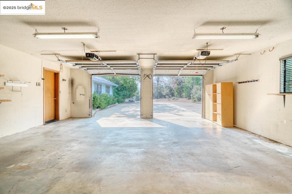 19195 Ferretti Road Groveland, CA 95321 - Photo 35 of 51 Garage with a garage door opener