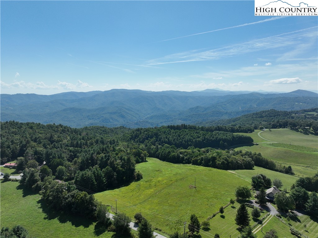 11 Wildcat Road Deep Gap, NC 28618 - Photo 9 of 10 an aerial view of a houses with a yard