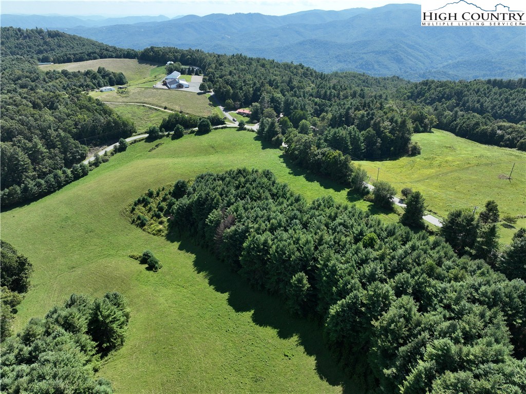 11 Wildcat Road Deep Gap, NC 28618 - Photo 10 of 10 an aerial view of a house with a yard