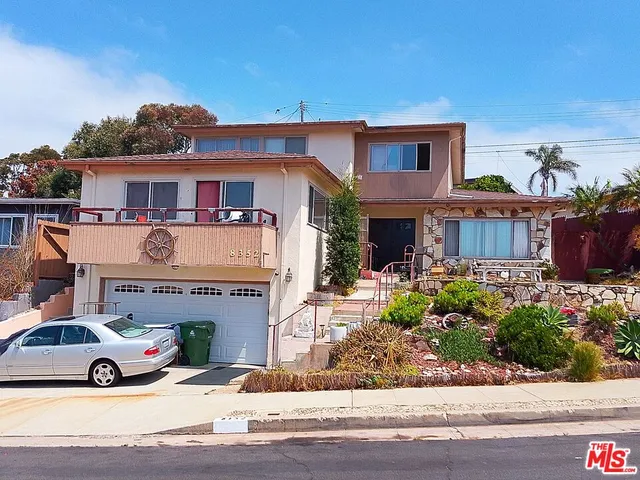 a car parked in front of a building