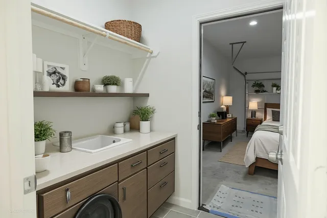 a en suite bathroom with a sink and a mirror