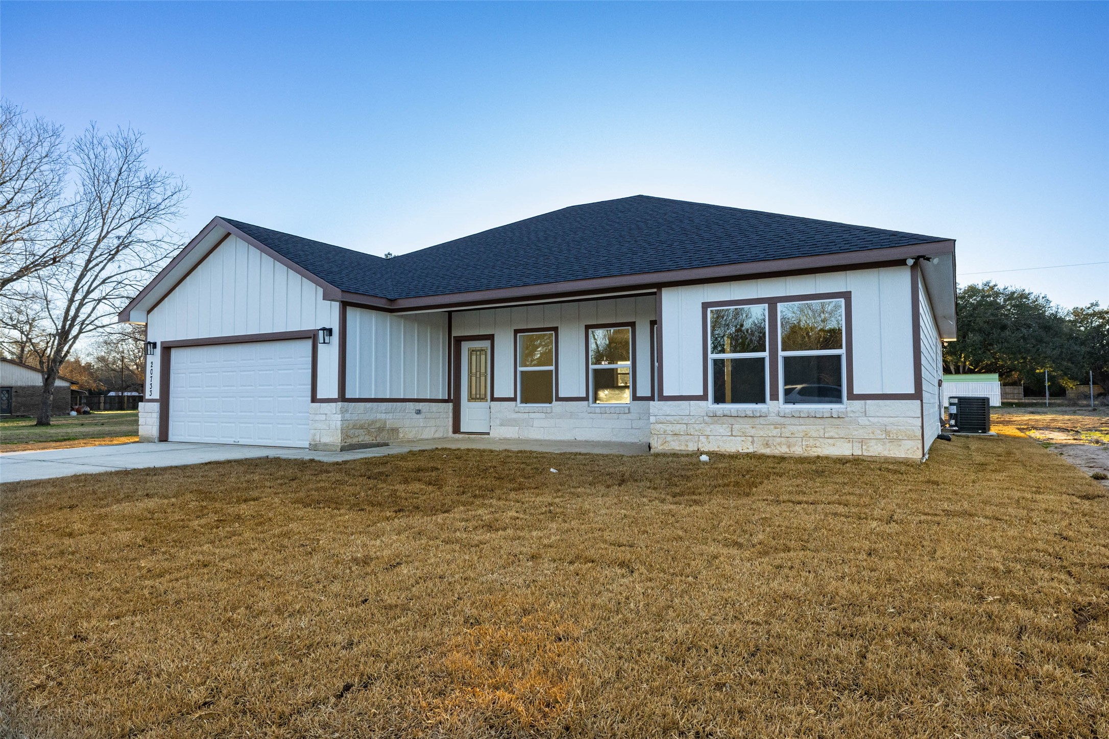20733 Emerald Street Prairie View, TX 77484 - Photo 32 of 34 a house that has a large pool in front of it