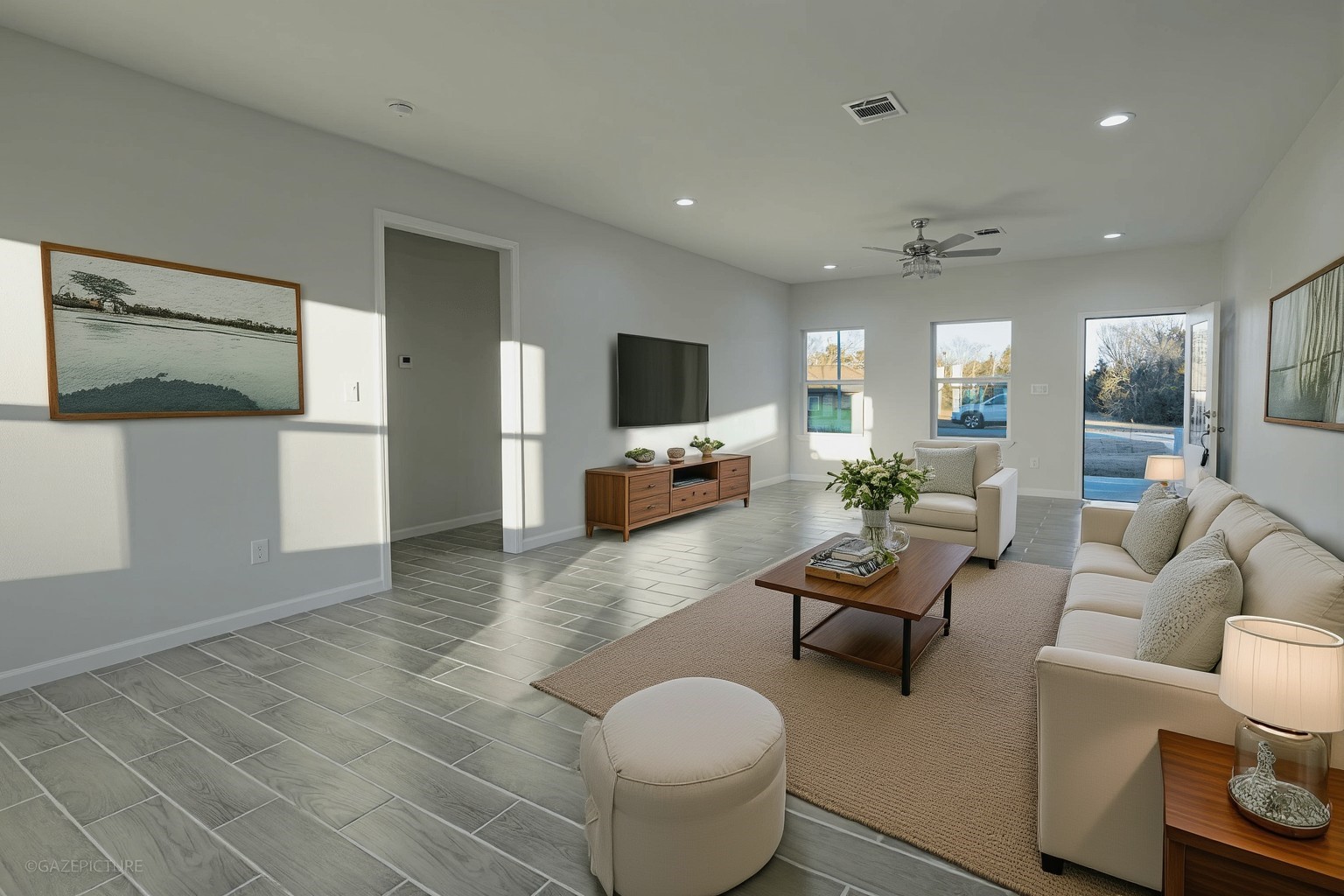 20733 Emerald Street Prairie View, TX 77484 - Photo 5 of 34 a living room with furniture and a flat screen tv