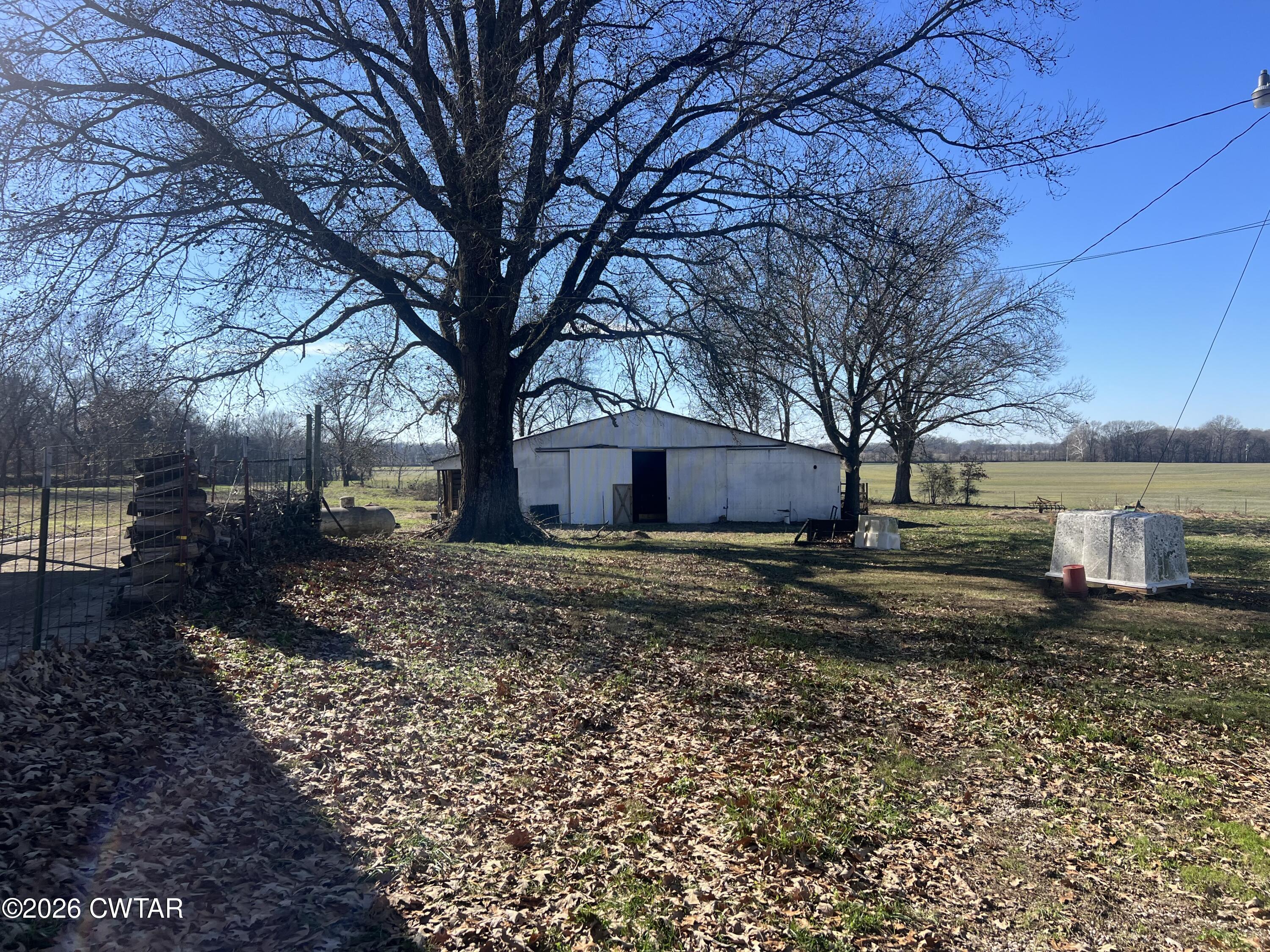 1527 Ashley Road Dyersburg, TN 38024 - Photo 2 of 14 a view of a house with a yard