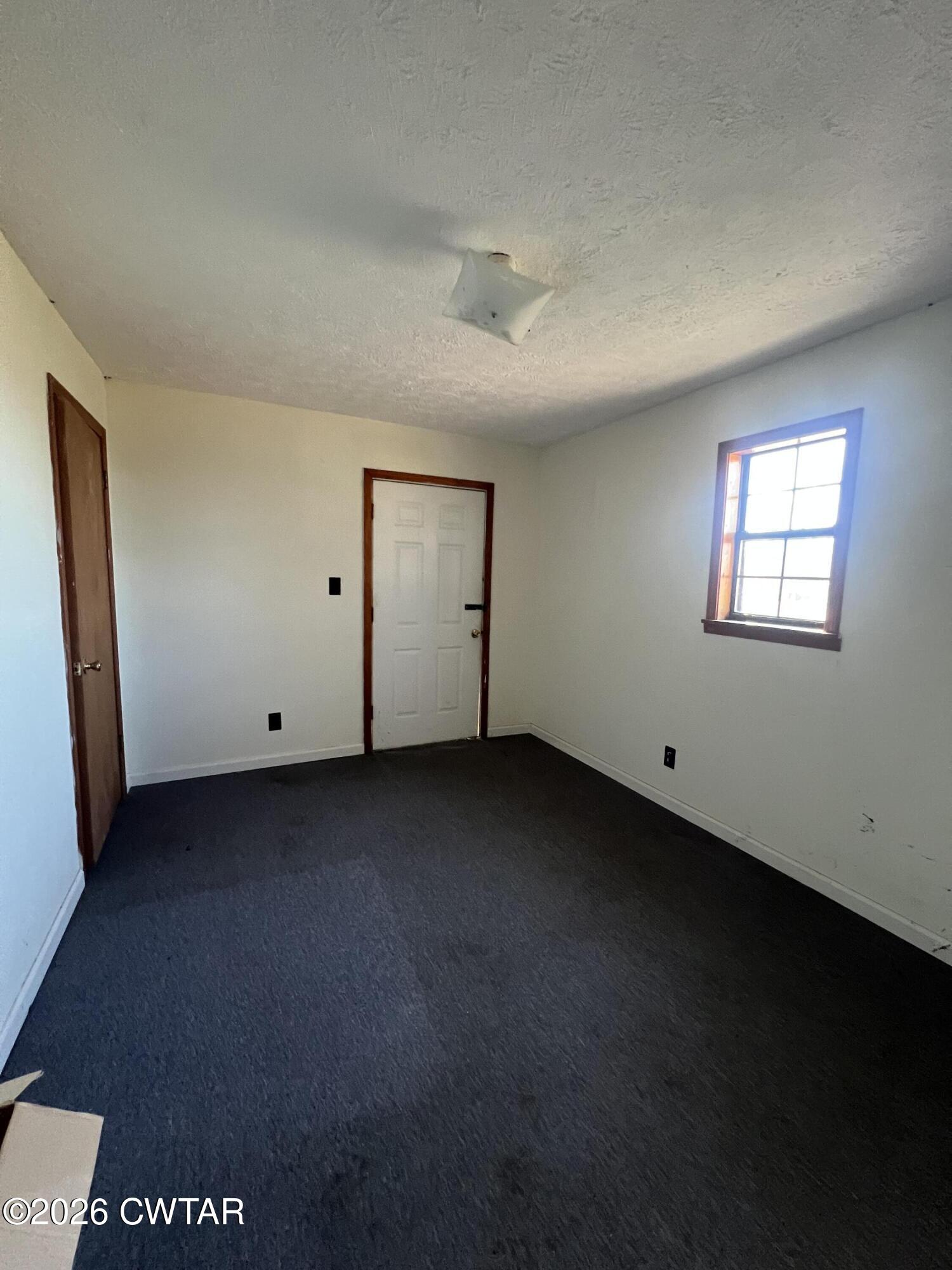 1527 Ashley Road Dyersburg, TN 38024 - Photo 10 of 14 a view of a room that has a large window