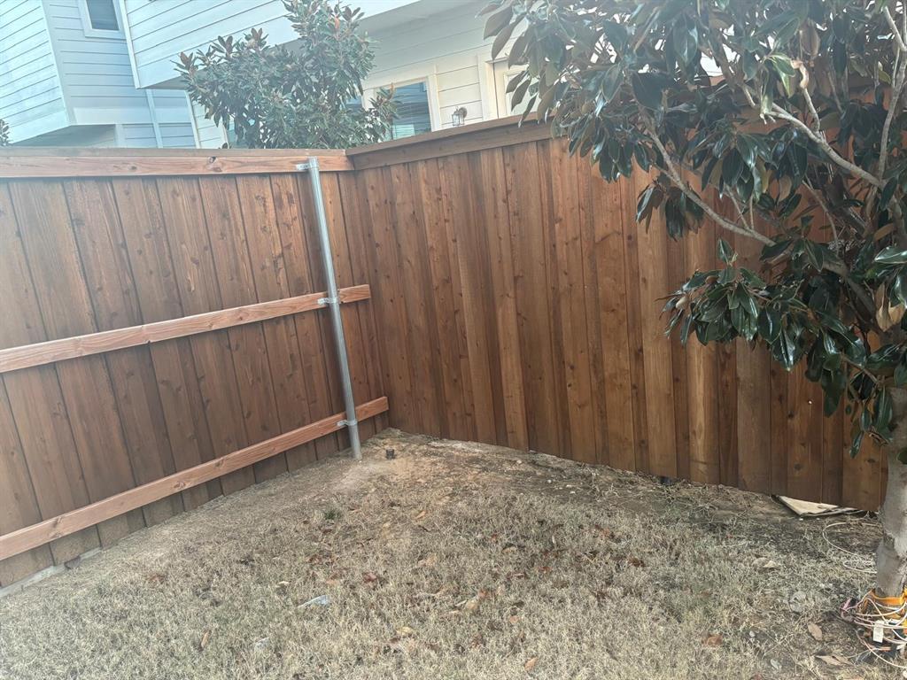 825 West Mayfield Road, Unit 224 Arlington, TX 76015 - Photo 16 of 25 a view of wooden fence
