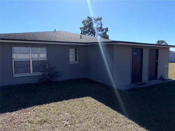 a bathroom with a shower and a toilet