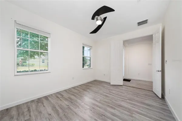 a view of entryway with wooden floor