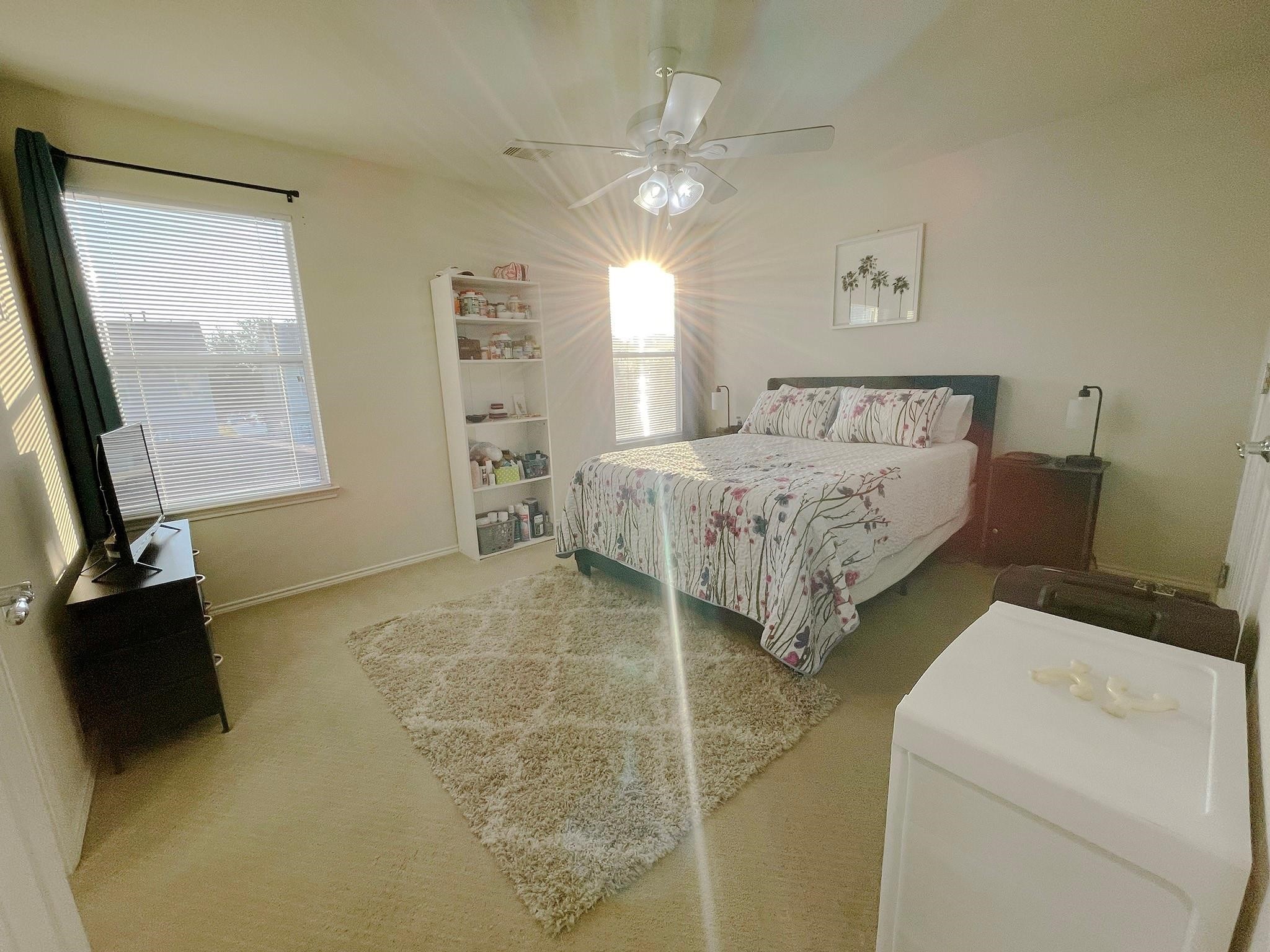 23614 Youpon Lake Lane Spring, TX 77373 - Photo 4 of 12 a bed room with a bed and a television