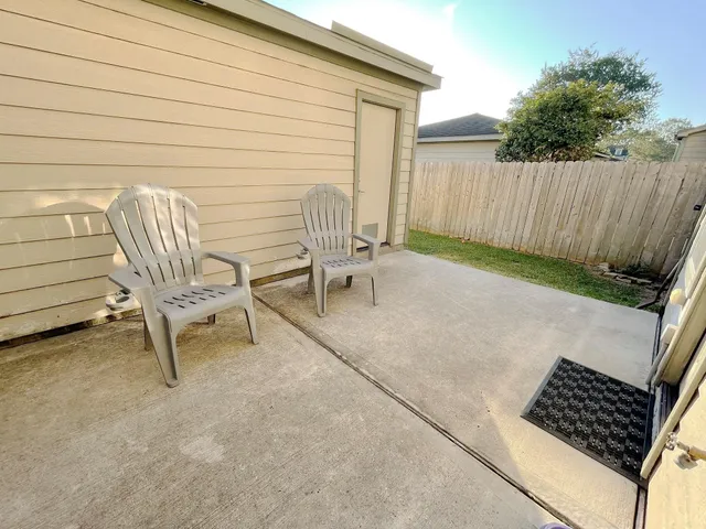 a view of outdoor space with chairs