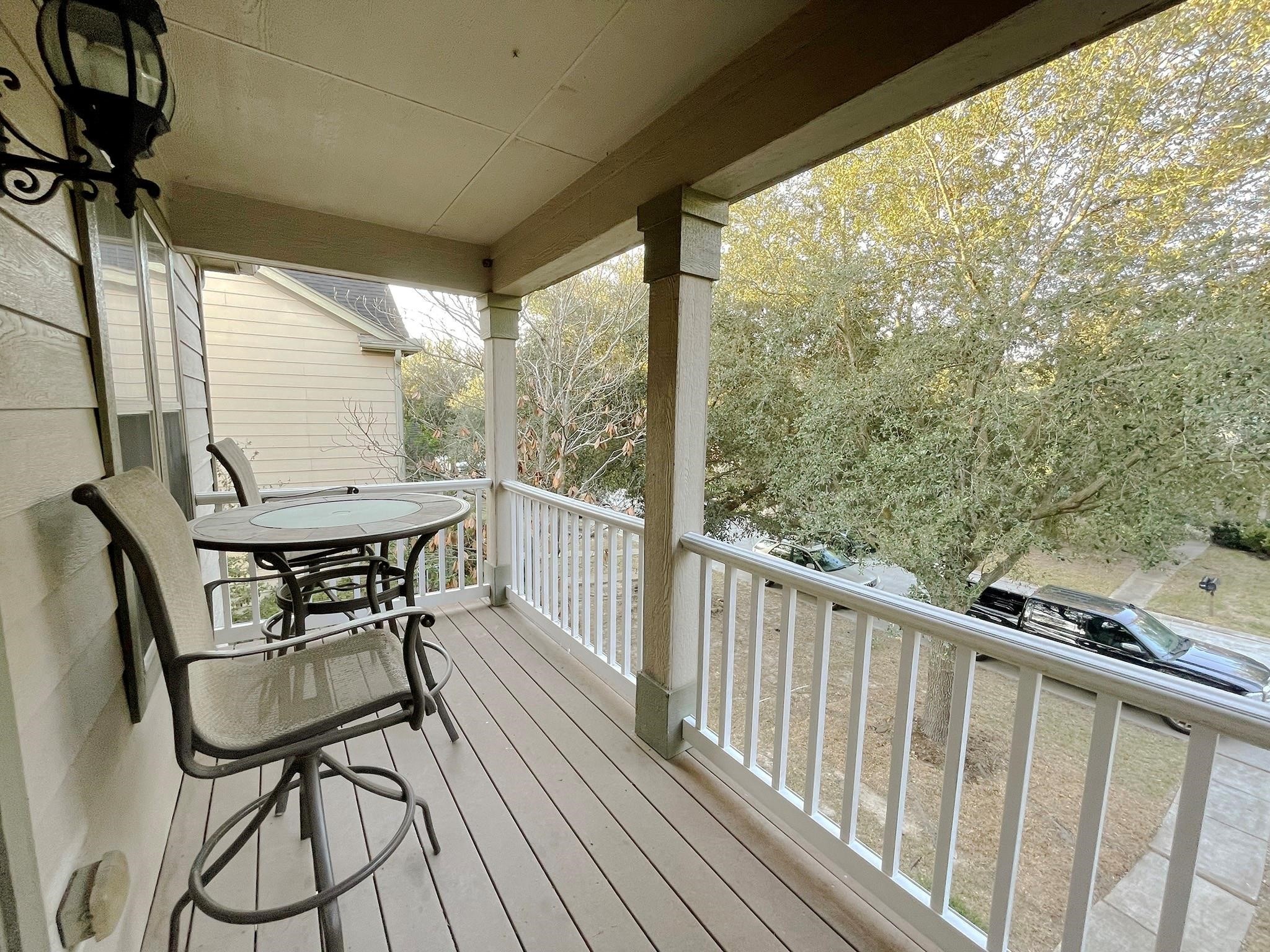 23614 Youpon Lake Lane Spring, TX 77373 - Photo 8 of 12 a view of a balcony with chairs