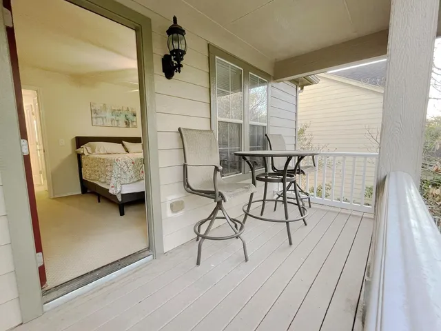 a view of dining room with furniture and wooden floor