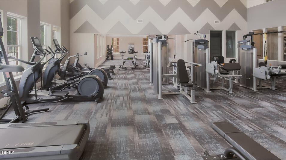 2528 Chert Lane Raleigh, NC 27610 - Photo 34 of 44 a view of a room with gym equipment