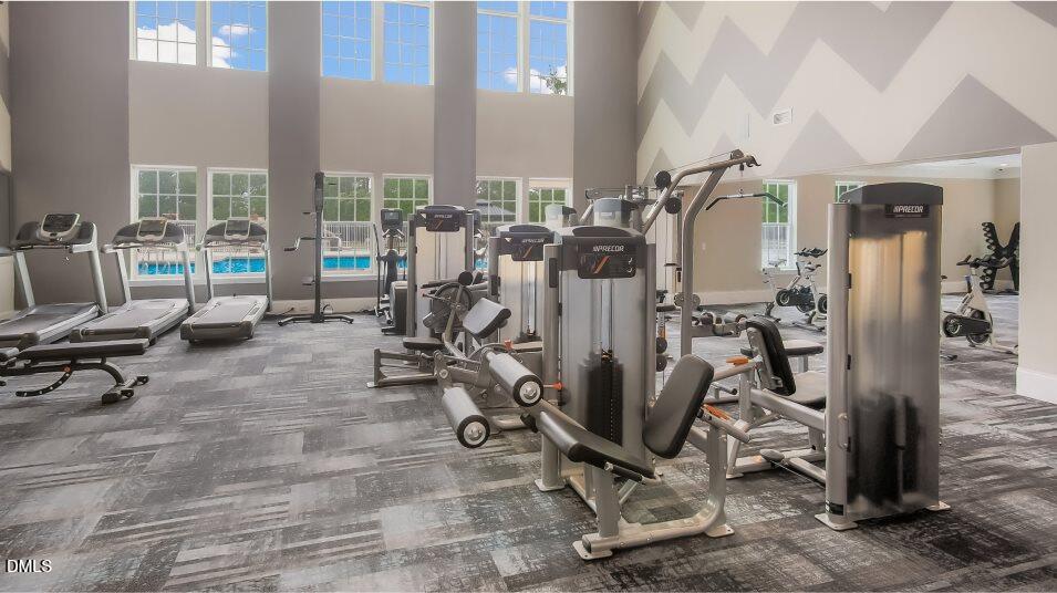 2528 Chert Lane Raleigh, NC 27610 - Photo 35 of 44 a view of a room with gym equipment