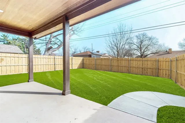 a view of backyard with green space