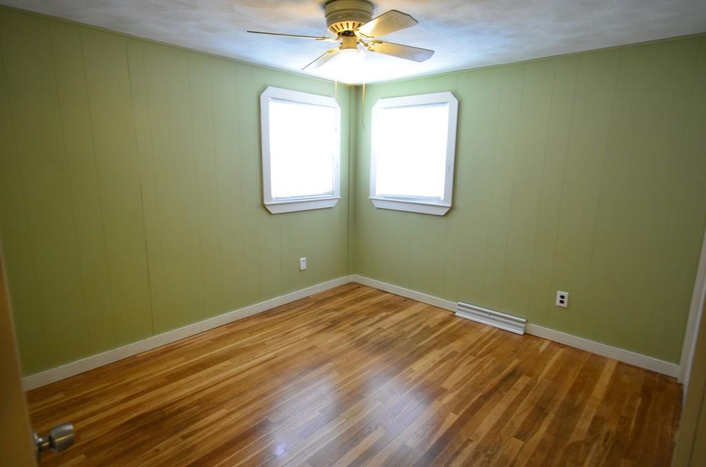 38 Cushing Road Webster, MA 01570 - Photo 13 of 18 a view of a room with a fan and a window