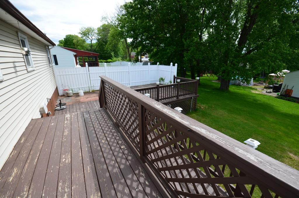 38 Cushing Road Webster, MA 01570 - Photo 14 of 18 a view of balcony with deck and wooden floor