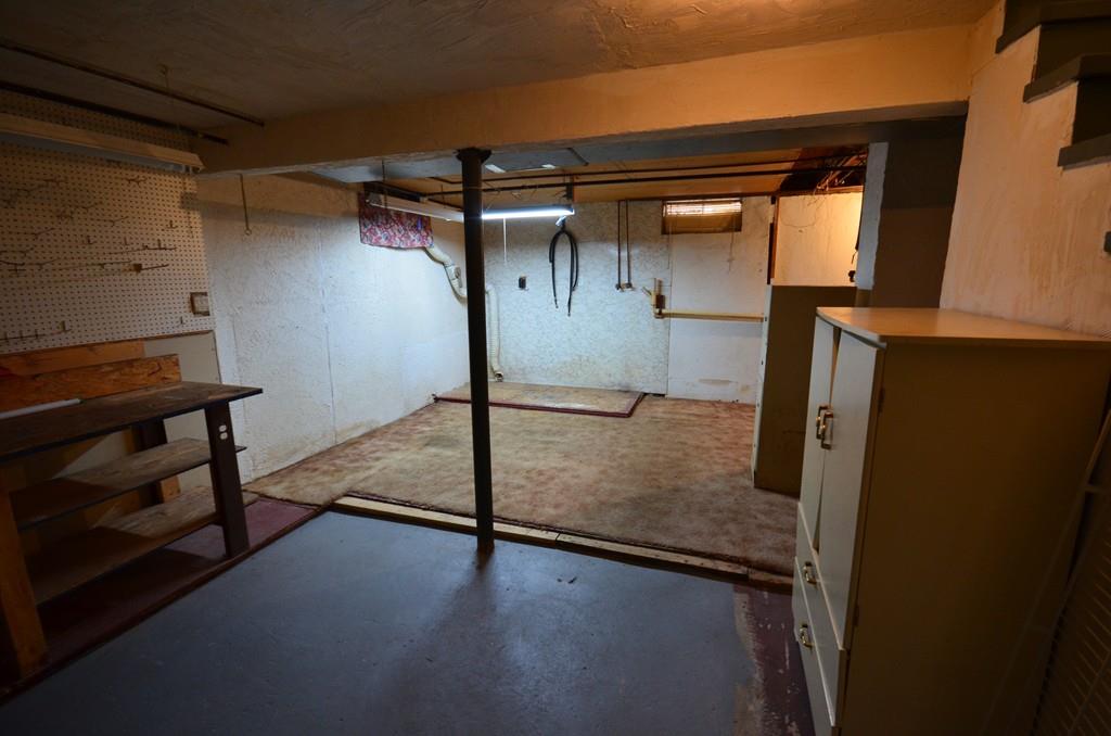 38 Cushing Road Webster, MA 01570 - Photo 16 of 18 a view of a room with wooden floor