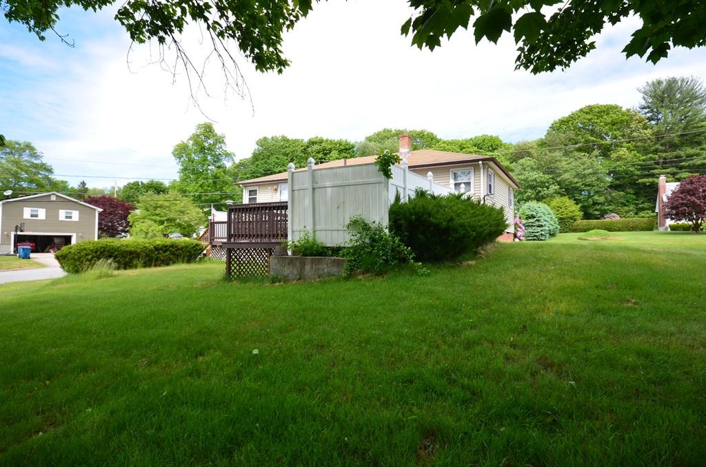 38 Cushing Road Webster, MA 01570 - Photo 5 of 18 a view of a house with a backyard
