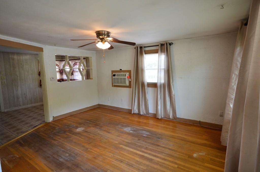 38 Cushing Road Webster, MA 01570 - Photo 6 of 18 wooden floor in an empty room with a window