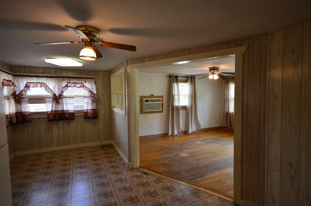 38 Cushing Road Webster, MA 01570 - Photo 7 of 18 a view of a hallway with wooden floor