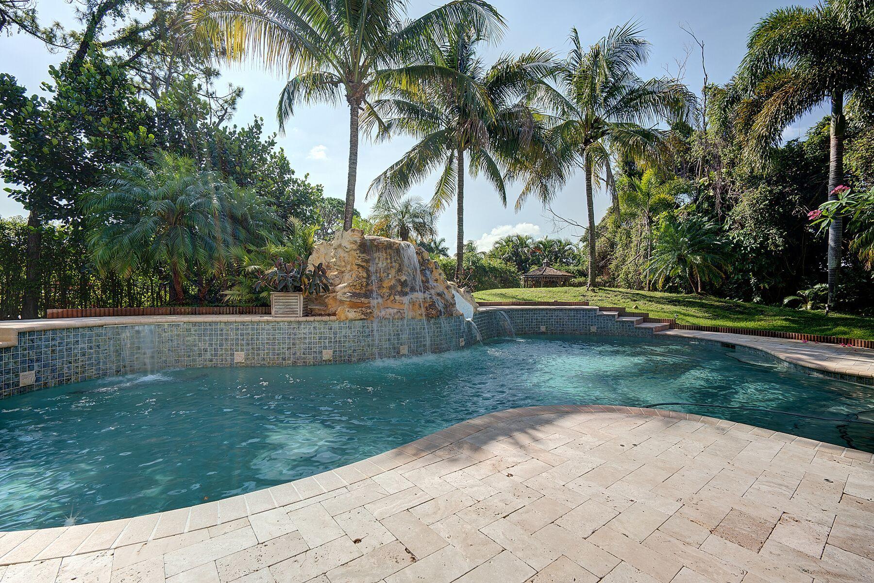 3860 Lone Pine Road Delray Beach, FL 33445 - Photo 3 of 44 pool with waterfall