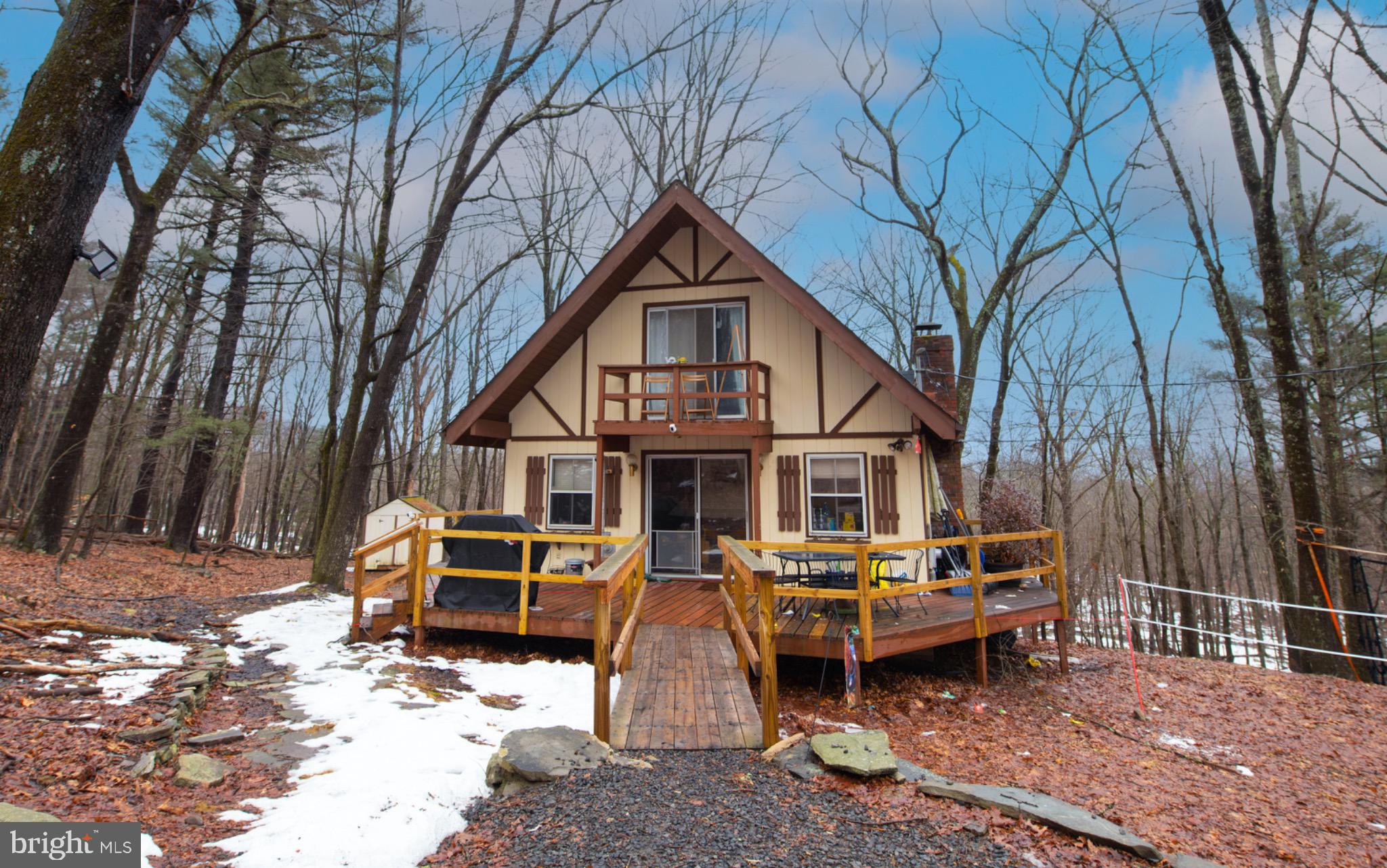 117 Swallow Circle Bushkill, PA 18324 - Photo 1 of 47 a small white house with a large outdoor space